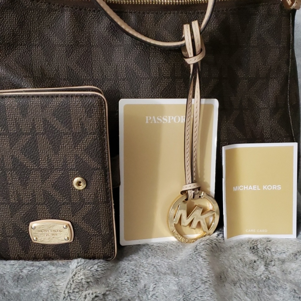 Michael Kors purse and matching passport holder.